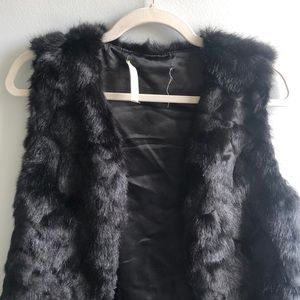 Black faux fur vest